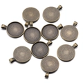 Detailed macro view of bronze alloy round pendant tray bases for DIY jewelry making - Inner Diameter 25mm / Antique Bronze