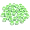 Macro detail of 20mm green and white striped resin beads for DIY jewelry making - Green