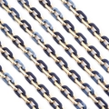Detail view of gold metal and blue marble acrylic chain links for necklaces and accessories - 10x15mm Ring, 1 Meter Length / Gold + Ink Blue