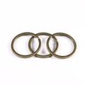 Close-up of vintage bronze flat split rings for DIY keychains and jewelry making - 25mm / Bronze