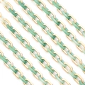 Detailed macro view of mint green resin links paired with polished gold metal chain loops - 10x15mm Ring, 1 Meter Length / Gold And Jade Green