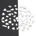 Macro view of assorted clear crystal rhinestones in various geometric shapes for nail art - White - Irregular