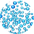 Macro shot of faceted sapphire blue flatback rhinestones for nail art and DIY jewelry - 3.5g/180pcs / Capri Blue - Round