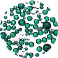 Close-up of emerald green flatback rhinestones with multi-faceted cut for nail art DIY - Peacock Green - Round