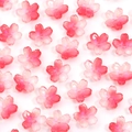 Macro shot of gradient pink cherry blossom beads with pearlescent finish for DIY jewelry - Red Cherry Blossom