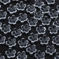 Macro detail of transparent cherry blossom glass beads for DIY jewelry making - Clear Sakura