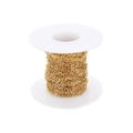 Close-up of golden stainless steel O-chain roll for DIY jewelry making accessories - 1.5*2.5MM / Gold