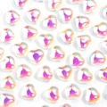 Macro view of gradient heart-shaped glass beads with AB iridescent finish and center hole - 8mm (50 Pieces) / AB Rainbow