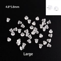 Macro detail of 4.8x5.8mm large silicone earring backs with transparent bullet shape - Bullet Shape Large