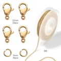 Macro view of 12mm lobster clasps, 5mm jump rings, and 3m gold chain jewelry DIY set - 3m Chain with 10 Lobster Clasps and 30 Jump Rings / Gold (2mm Dense Chain)