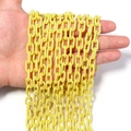 DIY yellow acrylic link chains held in hand for colorful jewelry making crafts - 50cm One Piece (Chain Width 13.5mm, Width 7.5mm, Wire Diameter 2mm) / Oval Link Chain (8575) / Yellow