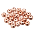 Close-up of rose gold rondelle spacer beads with smooth finish for DIY jewelry - 4mm / Rose Gold