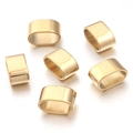 Detalle macro de cuentas ovaladas de acero inoxidable dorado para joyería de bricolaje - 8x4.5mm / Dorado