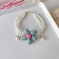 Detail of double-layer pearl pet necklace featuring a mint green fabric flower charm - XS / Double Layer Necklace / Green