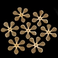 Detailed macro view of seven golden filigree mesh flower charms for DIY jewelry making - Precision Six-Petal Mesh Component (11#)