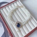 Detail van de dubbellaagse parelketting voor huisdieren met blauwe edelsteen en goud - XS / Koningsblauw Edelsteen