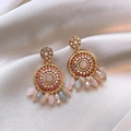 Close-up view showing the intricate detail of mandala-style earrings with pink crystal beads - Style 23 Mandala Hoop Drop