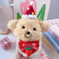 Close-up of plush bear with red knitted Christmas hat and strawberry crochet bib - One Size / Red Hat And Strawberry Bib