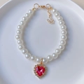 Elegant pet pearl necklace with a sparkling red heart pendant and gold lobster clasp - XS / Rose Red