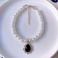 Elegant pearl pet necklace with vintage black gemstone pendant and gold lace setting - XS / Black