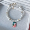 Elegant white pearl pet necklace featuring a floral enamel charm and gold hardware - XS Size (0.5-1.5kg) / Square Floral
