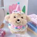 Detail of plush dog toy wearing pink crochet birthday hat and matching lace collar - One Size / Pink Scarf And Pink Hat
