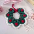 Detail of hand-knitted Christmas wreath pet collar with green yarn and red pompoms - One Size / Red Dot Scarf