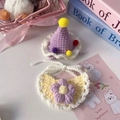 Handmade crochet pet hat and bib set with purple pompoms and floral detail for dolls - One Size / Purple Hat And Yellow Bib Style / Purple Hat And Yellow Bib