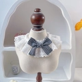 Detail eines Haustier-Spitzenhalsbands mit schwarz-weißer Karo-Schleife auf einer Puppe - XS / Schwarz Gingham Schleife Halsband