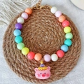 Close-up of colorful beaded pet necklace with cute pink pig pendant on woven mat - XS / Pink Pig