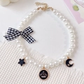 Collier de perles pour animaux avec nœud à carreaux noirs et pendentifs dorés - XS / Série Noire