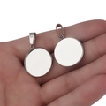 Macro view of silver round pendant trays with bail connectors for DIY jewelry making - 10mm (10 Pieces/Pack) / Silver
