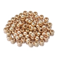 Macro view of polished gold-plated CCB spacer beads with center holes for DIY jewelry - Diameter 8mm (Hole 3.8mm, 100 Pcs, 20g) / Gold