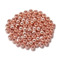 Macro shot of rose gold CCB beads with smooth metallic finish for DIY jewelry - Diameter 8mm (Hole 3.8mm, 100 Pcs, 20g) / Rose Gold