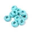 Macro shot of turquoise stone wheel beads with natural black veins for DIY jewelry - 10mm / Turquoise