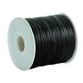 Macro detail of glossy black nylon cord on a spool for DIY jewelry and knot making - 1.5mm Thickness 80 Yards/Roll / Black