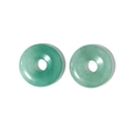 Close-up of two polished green agate donut pendants with smooth edges for DIY jewelry - Green Aventurine