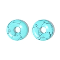Detailed view of light blue turquoise flat donut charms with natural black marble veins - Turquoise