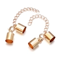 Detail of lobster claw clasp with extension chain and cylinder cord ends in rose gold - 3mm / KC Gold