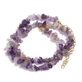 Detailed macro view of purple natural amethyst chip beads with a gold lobster clasp - Purple Crystal