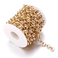 Close-up of golden aluminum round link chain spool for DIY jewelry and bag accessories - 10mm / Light Gold