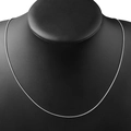 Polished silver snake chain in stainless steel on a black display neck model - 45cm / Round Snake Chain