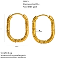 Detailed view of textured oval hoop earrings in 18k gold plated stainless steel - Oval Hammered Style (SE987G) / Gold