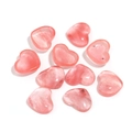 Detailed macro view of ten heart-shaped pink quartz stones showing natural textures - 15*18mm / Watermelon red