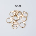 Detailed macro view of KC gold leverback earring hooks for DIY jewelry making - 14x12mm / KC Gold