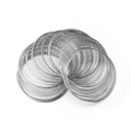 Macro shot of silver memory steel wire coils for DIY jewelry making and bracelets - Fine Gauge Multi Loop / White K/Silver