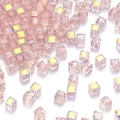 Macro shot of light pink AB coated cube crystal beads for DIY jewelry making - 4mm / Pink