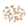 Close-up of golden copper cord end caps for DIY jewelry making and bracelet findings - Hole 2mm / KC Gold