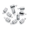 Detailed view of ten silver-plated copper cord end crimp connectors for jewelry making - Hole 2mm / White K/Silver