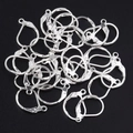 Close-up of silver lever-back earring hooks with spring closure for DIY jewelry making - 13*11mm / Silver